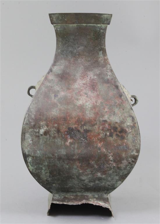 A Chinese archaic bronze wine vessel, Fanghu, Han dynasty, 3rd century B.C-3rd century A.D. , 34cm high, section of foot lacking